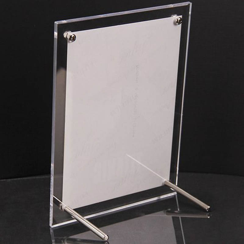 Acrylic photo frame with hardware feet