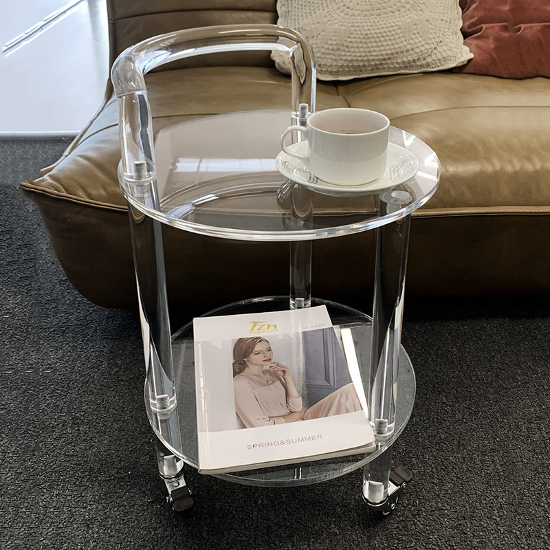 Custom-made acrylic edge tables and wheelbarrows